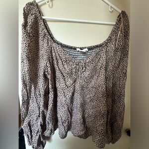 Francesca collections off the shoulder leopard blouse. Size: L
